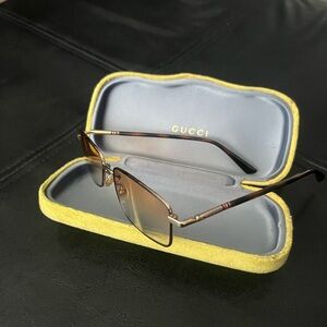 Gucci Sunglasses with Yellow and Brown Accents